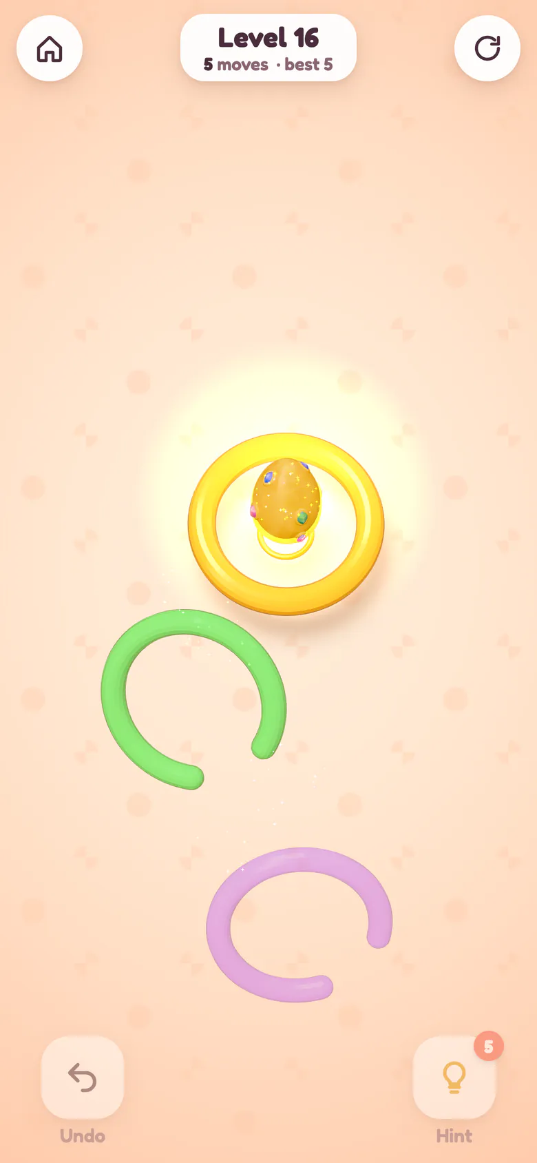 The last rings fly away as the golden egg glows inside the gold hub ring.